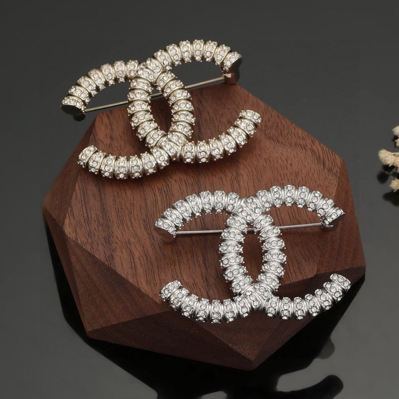 Ch**el brooches